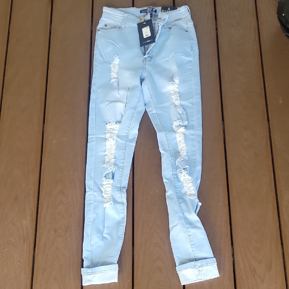 Fashion Nova Sky Blue Ripped Skinny Jeans